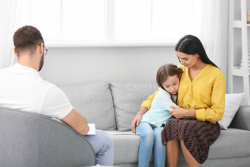 Mother with little daughter in psychologist's office