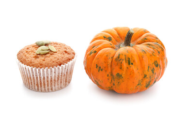 Tasty pumpkin muffin on white background