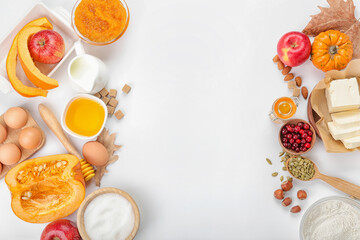 Ingredients for preparing pumpkin pie on white background