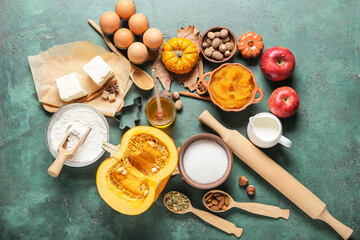Ingredients for preparing pumpkin pie on color background