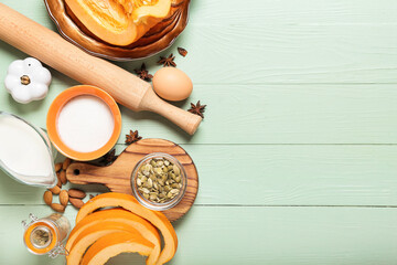 Ingredients for preparing pumpkin pie on color wooden background