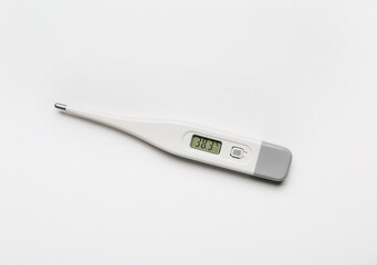 Electronic thermometer on light background