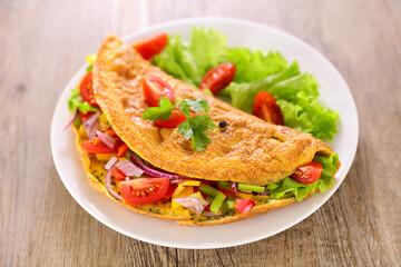 plate of omelet with vegetable