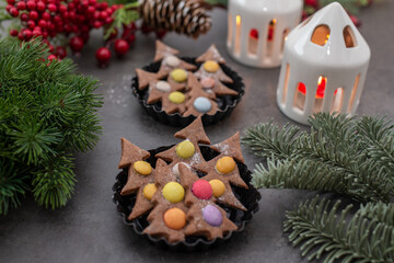 Fototapeta na wymiar sweet home made chocolate gingerbread christmas tree cookies
