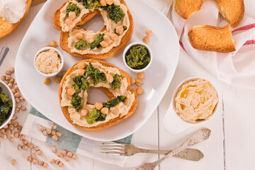 Friselle with turnip tops and hummus.