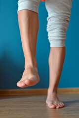 feet on a blue background