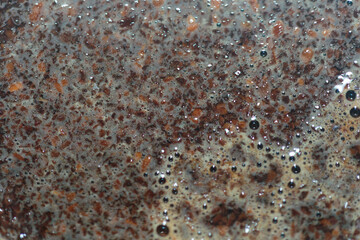 Natural foam of Turkish coffee closeup. Concept of art background.