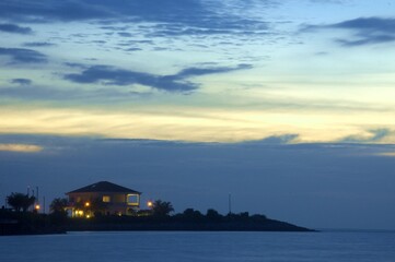 bunglow house during sunset standing on the manmade island in Port Dickson Malaysia
