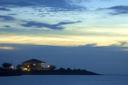 bunglow house during sunset standing on the manmade island in Port Dickson Malaysia
