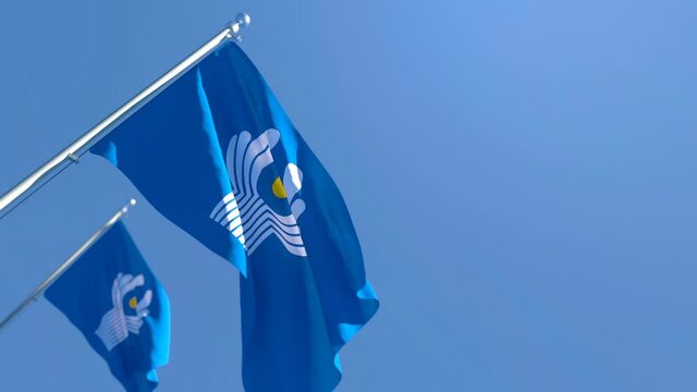 The national flag of Commonwealth of Independent States flutters in the wind