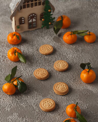 Christmas Wallpaper with tangerines. Tangerines and pine cones. Holiday pictures for Christmas