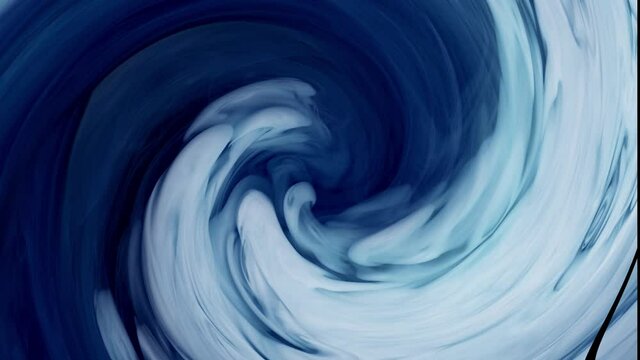 Organic flowing of blue and white liquids mixing and creating nice textures and smooth motion.