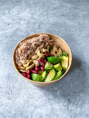 Healthy Food Bowl with Tuna Fish, Brussel Sprouts, Mexican Beans, Cashew and Whole Wheat Fusilli Pasta.