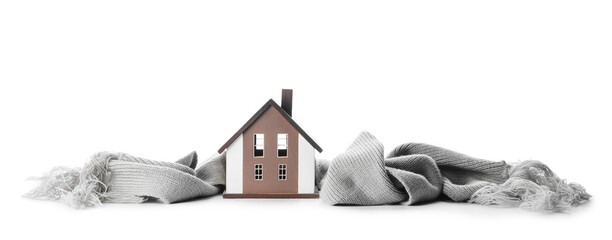 Figure of house and warm scarf on white background. Concept of heating season