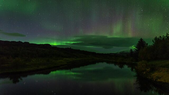 Beautiful Scene Of Aurora Borealis (Northern Lights) In Iceland At Night - timelapse