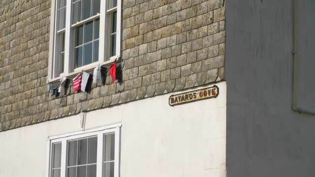 Road sign for Bayards Cove in Dartmouth in Devon, UK
