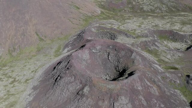 Aerial flying away from large crater on scenic Reykjanes peninsula