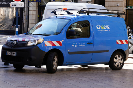 ENEDIS edf logo sign on blue panel van truck electricity provider french distribution company