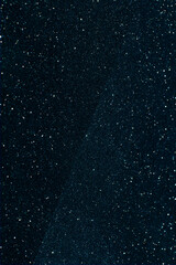 Black glitter bokeh circle glow blurred and blur abstract. Glittering shimmer bright luxury . White and silver glisten twinkle for texture wallpaper and background backdrop.
