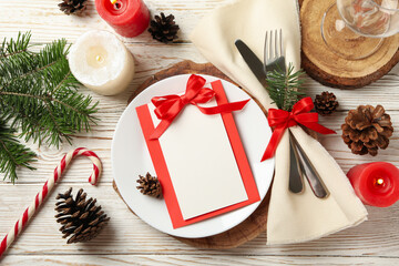 Concept of New year table setting on wooden background, space for text