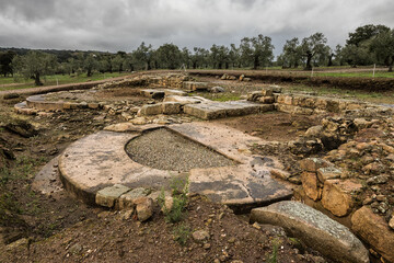 Rainy cloudscape over Roman ruins of Caparra, Extremadura, Spain