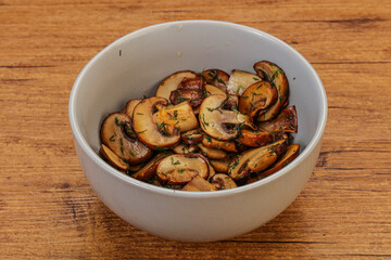Roasted champignon with herbs and spices