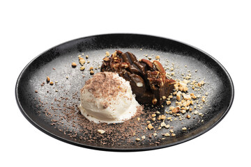Chocolate brownie with vanilla Ice ñream on black plate