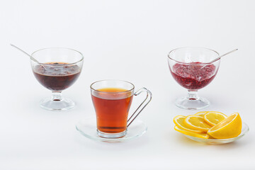 delicious tea with aromatic lemon and fragrant jam