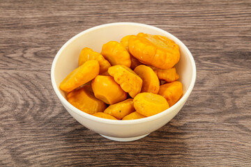 Marinated yellow patisson in the bowl