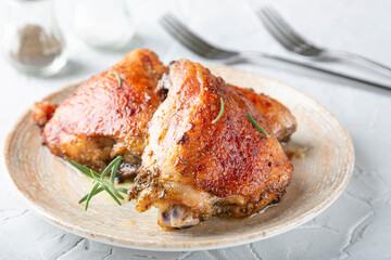 Fried crispy chicken thighs with spices