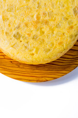 Tasty spanish omelette on a wooden tray on white background