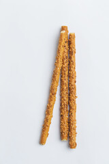 Bread sticks on a white background