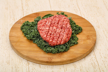 Raw beef burger cutlet for cooking