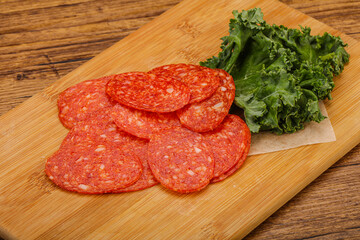 Italian spycy pepperoni sausage slices