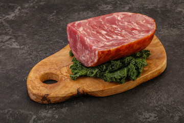 Beef ham piece over board