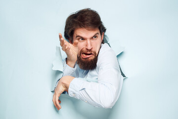 Emotional man breaks through the wall of emotions career work finance
