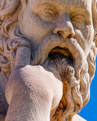 Socrates' portrait, the ancient philosopher and thinker, detail of a marble statue in Athens, Greece