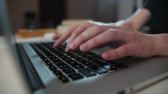 Hands of business woman professional user worker using typing on laptop notebook keyboard sit at home office desk working online with pc software apps technology concept, close up side view