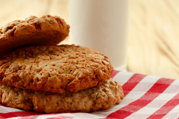 Oat cookies on wooden table close up