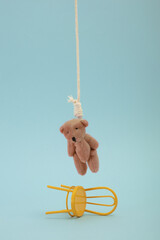Sad hanging teddy               .
