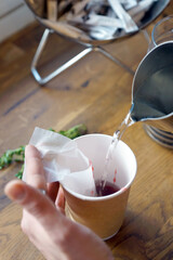 Black tea with jam in a paper cup