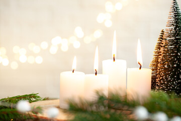 Christmas decoration four burning candle lights at christmas eve. Symbol for a religious ritual at...