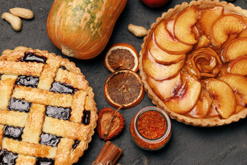 Berry tart pie and apple tart pie on black background