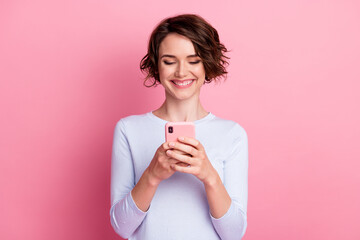 Portrait of positive girl use smartphone wear style stylish jumper isolated pastel color background