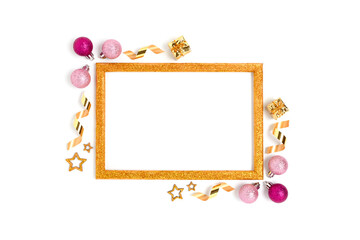 Frame made of Christmas toys and confetti on a white background. Holidays concept with copy space.