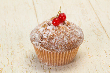 Sweet tasty muffin with red currants