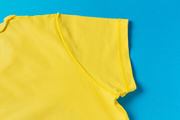 Yellow t-shirt on a blue background