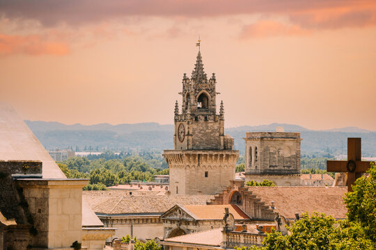 Avignon, Provence, France. Clock tower Jaquemart in Avignon, France. Altered Sunset Sky