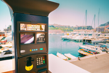 Parking machine with electronic payment at city parking. Fee payment for parking