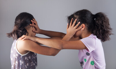 Two agressive girls having argue fight.